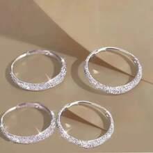 A Pair Of Earrings And Ear Rings That Everyone Loves