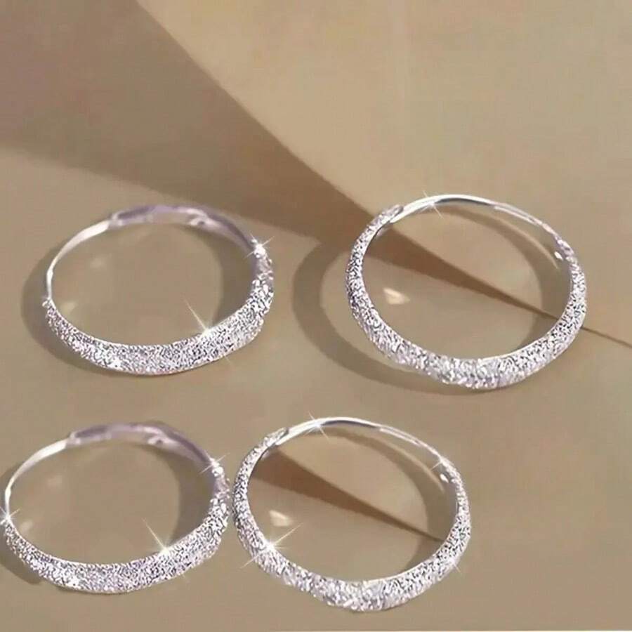 A Pair Of Earrings And Ear Rings That Everyone Loves