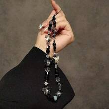 Cadena de linterna, accesorio para teléfono y collar con forma de mariposa negra hecha de cuentas creativas