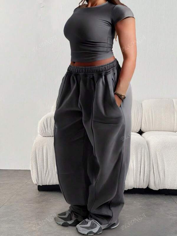 Plus Size Dames Casual Sport Effen Kleur Elastische Taille Naad Voorkant Losse Wijde Pijpen Broek