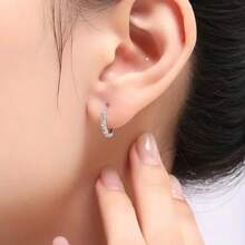 A Pair Of Earrings And Ear Rings That Everyone Loves