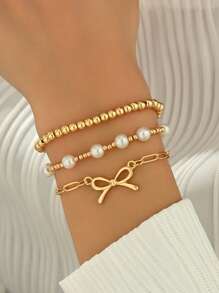 Conjunto de 3 pulseiras elásticas elegantes com pérolas românticas francesas e laços, pulseiras vintage multicamadas versáteis para mulheres, ideais para o verão, festas, encontros, feriados, combinação diária, presente