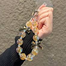 Pulsera de mujer con cuentas de cristal dorado y lazo, correa para teléfono anti-pérdida, regalo de Año Nuevo