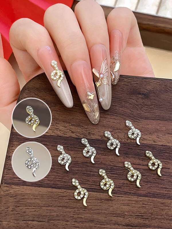 10 piezas de joyería para uñas de aleación de oro y plata con forma de serpiente, con incrustaciones de rhinestone, decoración de uñas brillante y delicada, estilo Ins