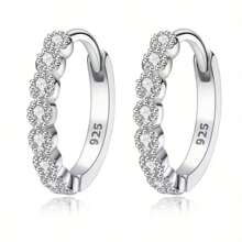 A Pair Of Earrings And Ear Rings That Everyone Loves