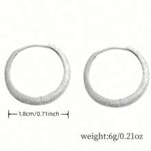 A Pair Of Earrings And Ear Rings That Everyone Loves