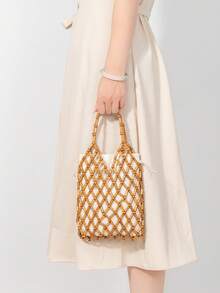 ENSPT Einteiliger, 5-farbiger perlenbesetzter Ausschnitt-Beutel mit Kordelzugverschluss. Die Beutelöffnung kann abgenommen werden und hat eine Innentasche. Diese strandtypische Tasche eignet sich für Damen, die gerne an der Küste sind.