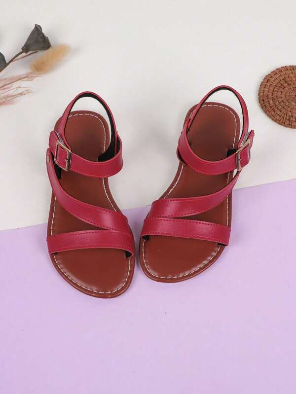 1 par de sandalias planas de punta redonda para niñas, zapatos casuales de estilo romano con punta hueca