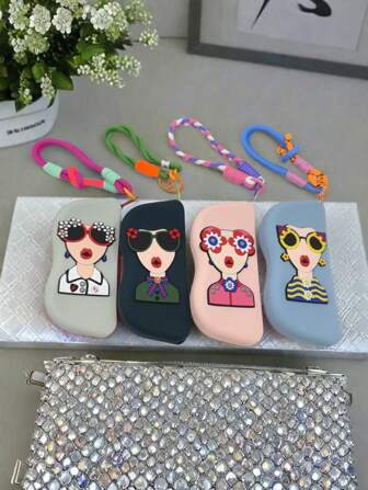1 pieza Bolsa de gafas de moda portátil de silicona, diseño de dibujos animados, versión mejorada con cuerda resistente, (incluye paño de gafas gratis), puede almacenar lápiz labial y artículos de maquillaje, estuche de gafas lindo