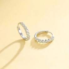 A Pair Of Earrings And Ear Rings That Everyone Loves