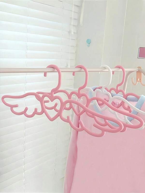 10 Stücke Haushalts-Engelflügel Kunststoff Kleiderbügel, süße rosa herzförmige Flügel Wäschetrockner für Schlafzimmer, Halterungen zum Aufhängen von Krawatten und Schals, Wäschetrockner für Unterwäsche. Süßer Kleiderbügelständer, nahtlos rutschfeste Schwingen-förmige Bügel, rosa 10er-Set, geeignet für Mäntel, Jacken, Kleider, Hosen, Röcke, Hemden, Unterwäsche und Unterhosen.