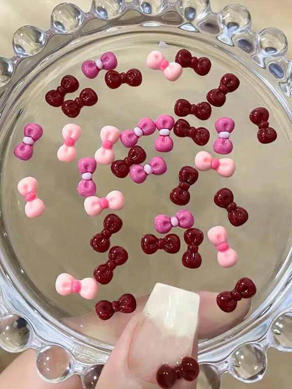 60 piezas Decoraciones para arte de uñas con forma de corazón de lazo - Lazos decorativos de gato de dibujos animados, Rhinestones de resina, para manualidades DIY, fundas de teléfono y accesorios, diseños de corazones rosados y rojos, regalo perfecto para manualistas, decoración de arte de uñas