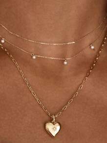 Exquisiter vergoldeter 925er Sterling Silber Anhänger mit einzigartigen eingelassenen Zirkonias in Herzform für Mädchen Halsketten