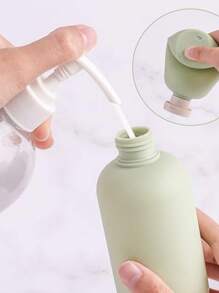 1 pièce Bouteille de voyage en silicone, Contenant de voyage à pression 200 ML étanche, Bouteille de voyage portable et rechargeable, Convient pour les articles de toilette, le shampooing et le revitalisant