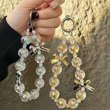Pulsera de mujer con cuentas de cristal dorado y lazo, correa para teléfono anti-pérdida, regalo de Año Nuevo
