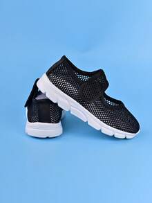 1 par de tênis esportivos infantis de malha de cor sólida com fecho de , minimalistas, práticos, confortáveis, macios e modernos