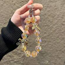 Pulsera de mujer con cuentas de cristal dorado y lazo, correa para teléfono anti-pérdida, regalo de Año Nuevo