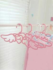 10个装家用爱心天使翅膀塑料衣架，可爱粉色心形翼形晾衣架宿舍用，领带围巾挂架，内衣晾晒架。可爱衣帽架，天鹅翼形无缝防滑衣架，粉色10个装衣架，适用于大衣、夹克、连衣裙、裤子、裙子、衬衫、内衣和内裤。 - 彩色 - 查看 11