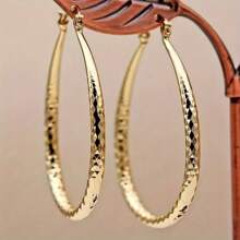 A Pair Of Earrings And Ear Rings That Everyone Loves