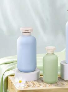 1 pièce Bouteille de voyage en silicone, Contenant de voyage à pression 200 ML étanche, Bouteille de voyage portable et rechargeable, Convient pour les articles de toilette, le shampooing et le revitalisant