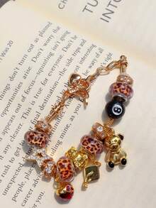 1pc Back-To-School Leopard Print Teddy Bear Charm Bracelet, Streetwear Star Bracelet, Graduation Cap Bracelet, Renaissance Style Teddy Bear Bracelet, Dark Skeleton Charm Bracelet - Gold - View 6