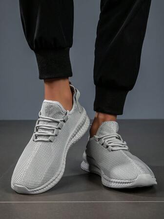 Chaussures de sport respirantes et légères pour hommes, de couleur grise, avec une semelle fine, style casual style glissant pour les vacances à l'extérieur