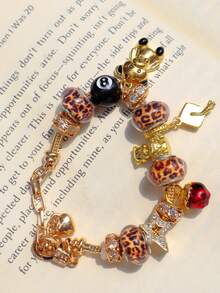 1pc Back-To-School Leopard Print Teddy Bear Charm Bracelet, Streetwear Star Bracelet, Graduation Cap Bracelet, Renaissance Style Teddy Bear Bracelet, Dark Skeleton Charm Bracelet - Gold - View 9
