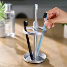 Black Stainless Toothbrush Holder Stand: Rustproof Bathroom Countertop Organizer, 4 Ventilated Slots Hold Manual Toothbrushes, Razor, Toothpaste Tube, Non‑Slip Compact Sink Caddy