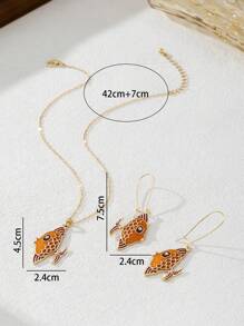 Set de aretes y collar con peces dorados esmaltados de moda y lindos
