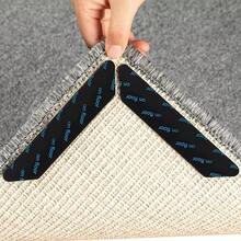 Cinta antideslizante reutilizable - Almohadillas sin rastro de 12 piezas para alfombras, alfombras y tapetes - Negro - Ver 5