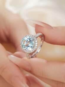 1 件优雅奢华 S925 纯银 2.3 克拉合成蓝色圆形水晶光环戒指，适合女性日常佩戴、婚礼、派对