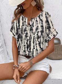 Women's Casual V-Neck Short Sleeve Allover Print Shirt With Notched Hem
