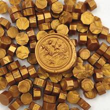 100 sztuk/worek Metalowe ośmiokątne koraliki do pieczętowania woskiem, używane do pieczętowania kopert, zaproszeń ślubnych, koralików do pieczętowania opakowań prezentowych