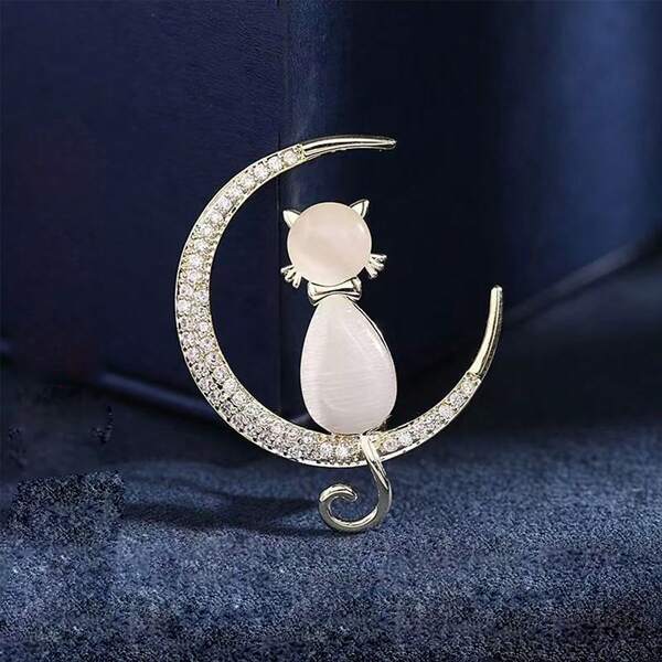 Spilla di moda elegante con pietra a forma di luna e occhio di gatto, accessorio premium con spilla di sicurezza per il bavero