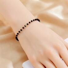 1 Stück elegantes, retro-bohemian-artiges schwarzes Armband aus Harz-Perlen und Edelstahlkette