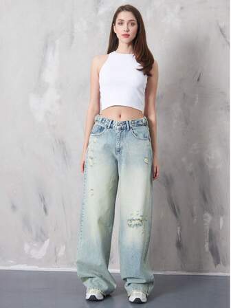 Damjeans med lösa fickor, revade fickor, knappar och vida ben, casual