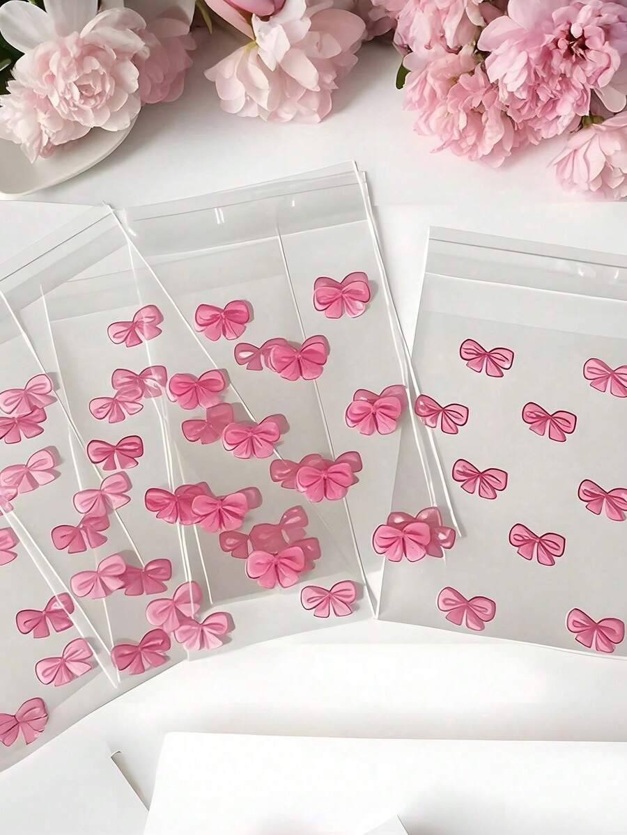 100pcs Pink Bow Self-Adhesive Bags, Photo Card Zipper Bags, Packaging Bags, Cute OPP Bags For Back To School, Graduation, Party, Wedding, Birthday, Bridesmaid, Packaging, Transparent, Small Size, Wedding Party Favors, Birthday Party, Souvenirs, Bride Gift, Bachelorette Party Supplies, Gift Packaging - Baby Pink - View 1