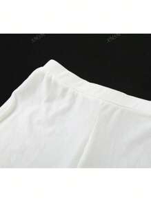 Ensemble deux pièces femme mode décontracté, Top à manches courtes col rond élastique slim et pantalon évasé. Tenue de sport pour le printemps et l'automne