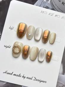 Set di 10 pezzi di unghie finte ovali fatte a mano, con occhi di gatto in oro aurora e argento, con effetto sfumato bianco e una forma tridimensionale floreale realizzata a mano, per un aspetto elegante e alla moda. Riutilizzabili, inclusi gli strumenti per indossarle, adatte a qualsiasi stile di abbigliamento quotidiano femminile, e possono essere regalate per feste, festival e celebrazioni