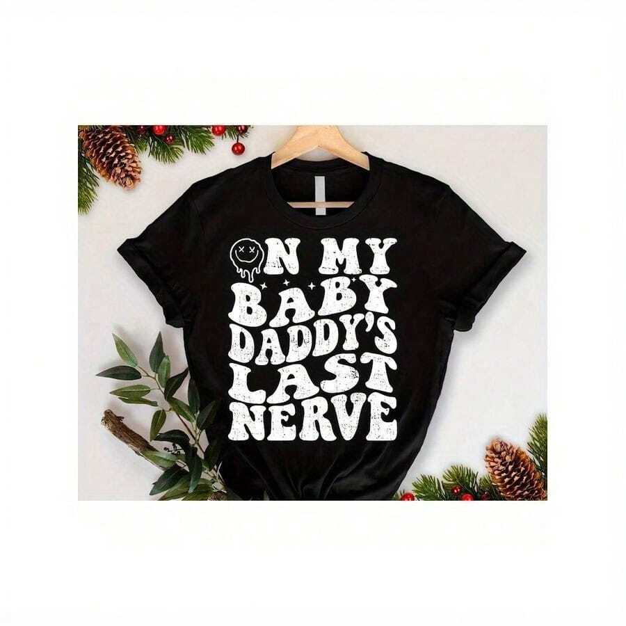 On My Baby Daddy's Last Nerve Shirt,Baby Daddy 220-Gram Heavy-Duty Cotton Jersey With Motivational Quotes, Featuring A Loose Bow Short-Sleeve Top Designed For Curvy, Curvy, Or Oversized Enthusiasts. Suitable For Women Of All Sizes In A Comfortable, Snug Shirt Made Of Breathable Fabric With Beautiful Butterfly Patterns, Exuding Confidence. Perfect For Spring And Summer Outfits, Leisure, Travel, Or Casual Workdays, This Fashionable Top Is Ideal For Big Girls, Positive Body Messages, And Is An Ideal Gift For Sisters, Wives, Or Friends Who Enjoy A Comfortable Appearance.T-Shirt. - Black - View 1