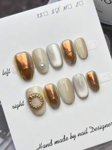 Set di 10 pezzi di unghie finte ovali fatte a mano, con occhi di gatto in oro aurora e argento, con effetto sfumato bianco e una forma tridimensionale floreale realizzata a mano, per un aspetto elegante e alla moda. Riutilizzabili, inclusi gli strumenti per indossarle, adatte a qualsiasi stile di abbigliamento quotidiano femminile, e possono essere regalate per feste, festival e celebrazioni
