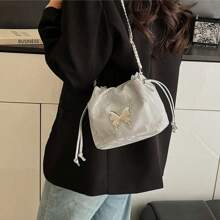 Borsa a tracolla da donna alla moda, con coulisse e farfalla, stile retrò 2025, stile elegante, stile celebrità, stile retrò moderno, stile casual, stile semplice, posto di lavoro, ufficio, appuntamenti, viaggio, vacanza, shopping, festa, cena.