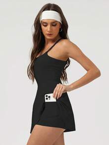 Sodalemon Conjunto de falda deportiva para mujer con parte superior sin mangas con diseño de espalda cruzada para fitness, gimnasio, tenis, yoga, running y actividades al aire libre