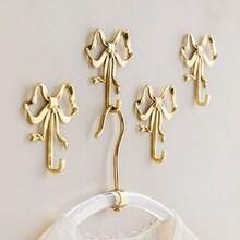 1pc/2pcs Gold Brass Bow Tie Wall Hook - Polished Wall Mounted Decorative Hook With Screws, Suitable For Hanging Clothes, Towels, Bags, Doors, Bathrooms, Kitchens And Bedrooms, Also Suitable For Holiday Decorations, Mother's Day Gifts, Graduation Gifts, Home Essentials - Multicolor - View 1