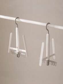 1 Stück vielseitig drehbarer Doppelhaken Schuhständer für Zuhause und Terrasse, windgeschützter Schuhaufhänger ideal für Studentenwohnheime, effiziente Sandalentrocknung Rack perfekt zum Organisieren von Schuhen, stilvolles und platzsparendes Design für Eingangsbereiche, Balkone und Außenbereiche, unverzichtbare Aufbewahrungslösung für saisonale Schuhe, verbessert die Wohndekoration und hält Schuhe ordentlich und zugänglich