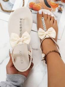 Nuevas sandalias tipo chanclas estilo princesa planas, sencillas y de moda con lazo y decoraciones de strass, lanzamiento 2025