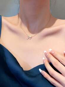 精致蝴蝶结金色方晶锆石吊坠项链，可调节钛钢链，优雅百搭的珠宝礼物，适合送给女朋友 - 1153n - 查看 2