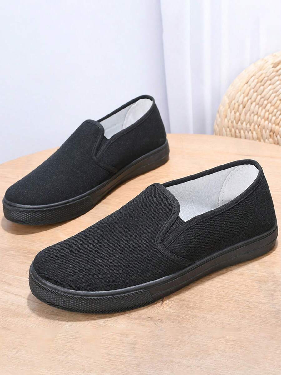 女士经典耐用平底一脚蹬休闲鞋，纯色防滑软底帆布工作鞋