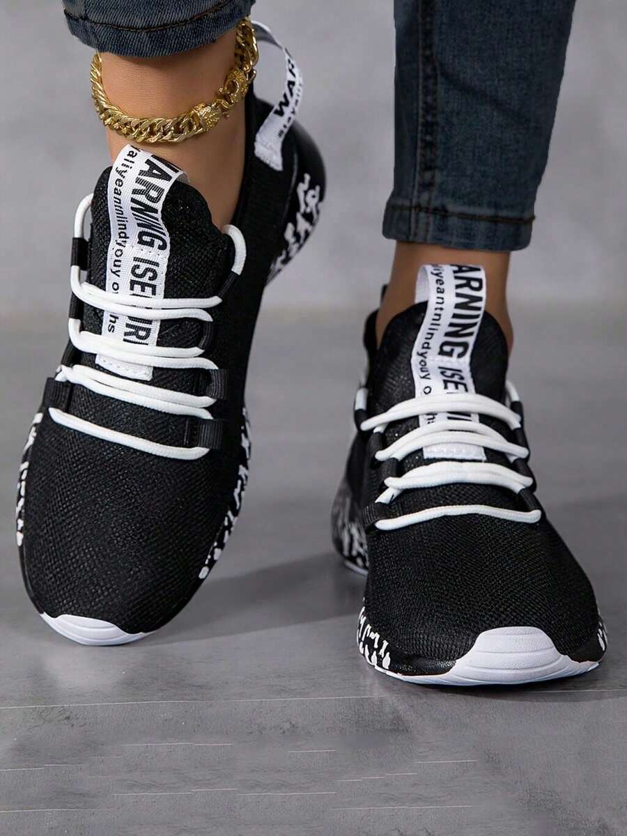 Zapatos deportivos casuales para mujer, tejidos en tela de punto livianos y transpirables, con suelas elásticas blandas, con ventajas de absorción de impactos y resistencia al desgaste, un par de zapatos deportivos y de ocio para todo el año - Negro - Ver 1