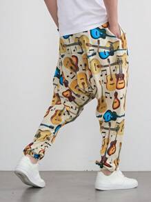 Pantalones harem sueltos de moda con gráfico de guitarra para hombres, uso casual diario, estilo hip hop y rock